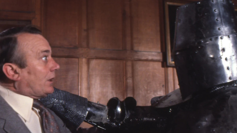 Norman Shenley (Denholm Elliott) gets attacked by knight on Hammer House of Horror