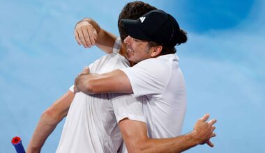 Hubert Hurkacz and Nicolas Massu embrace after Hurkacz's win against Alexander Zverev earlier in the United Cup.