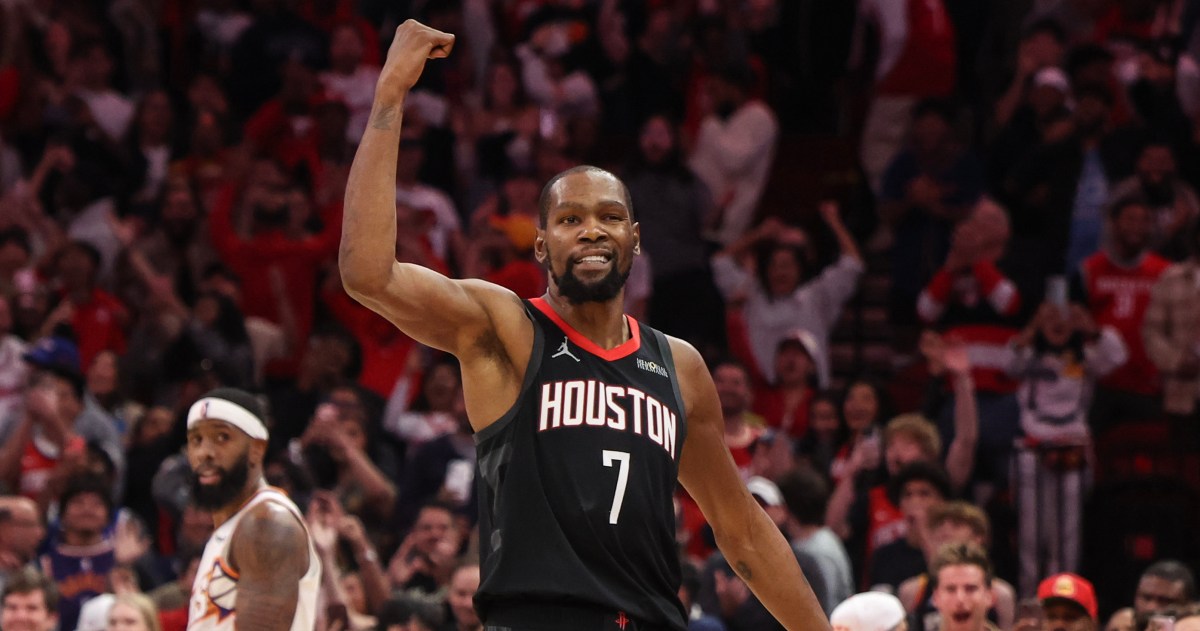 Rockets get to 100 over Suns - 100-97