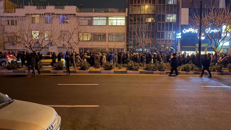 In this photo obtained by The Associated Press, Iranians attend an anti-government protest in Tehran, Iran.