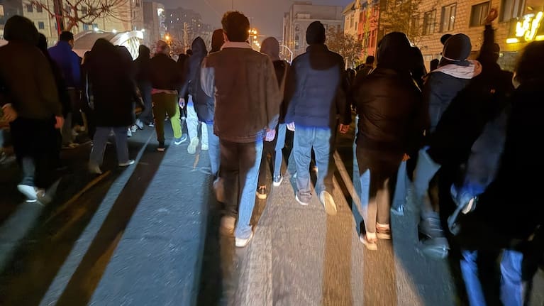In this photo obtained by The Associated Press, Iranians attend an anti-government protest in Tehran, Iran.