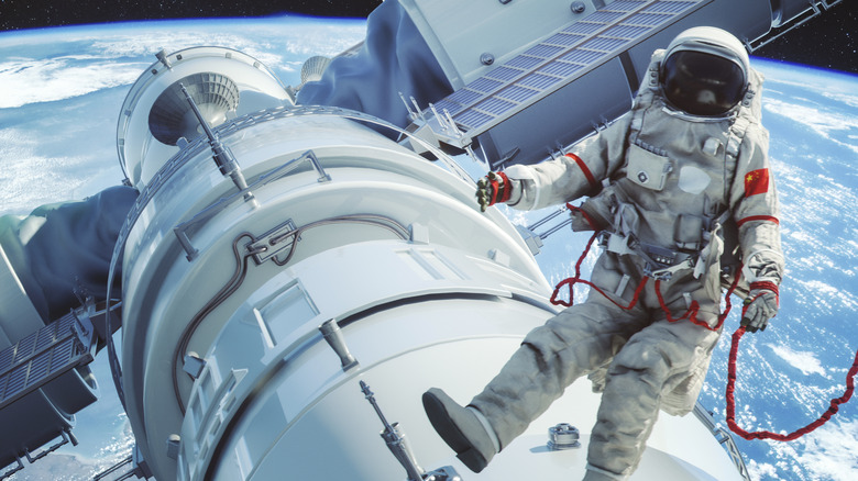 Chinese taikonaut over the Tianhe main module