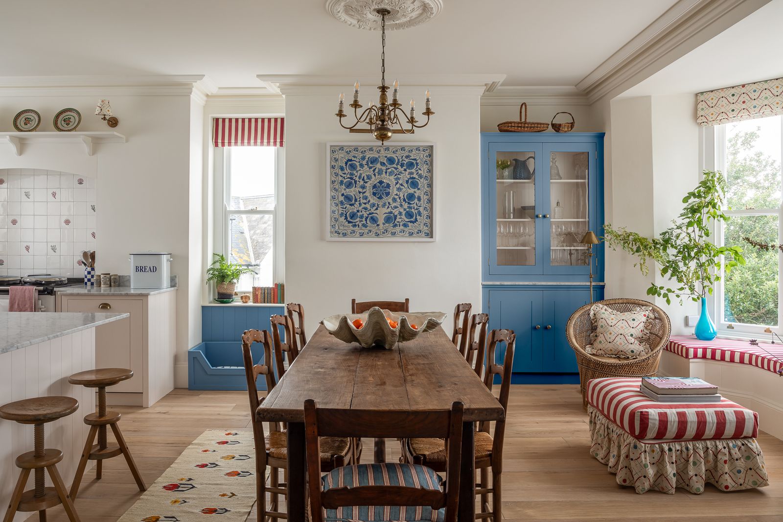 Image may contain Architecture Building Dining Room Dining Table Furniture Indoors Room Table Chandelier and Lamp