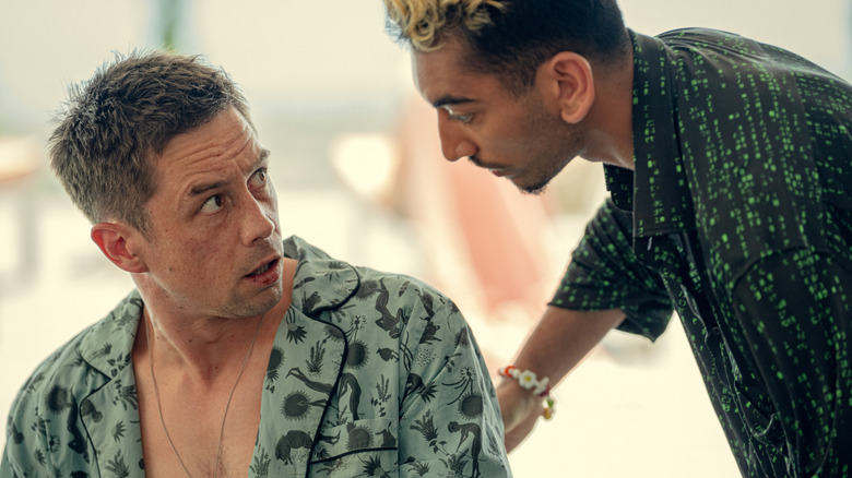 Orpheus looking worriedly at Dionysus in 