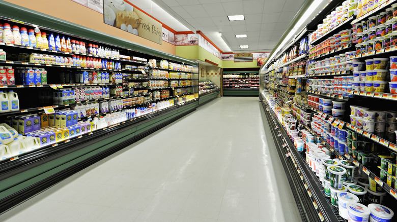Aisle in grocery store with dairy products