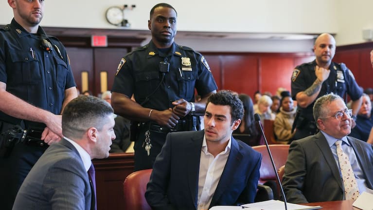 Luigi Mangione appears in Manhattan Criminal Court for an evidence hearing, December 18, 2025, in New York.