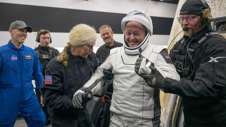 NASA astronaut Mike Fincke is helped out of the SpaceX Crew-11 capsule.