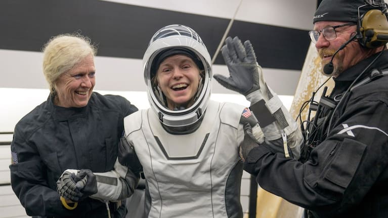NASA astronaut Zena Cardman is helped out of the SpaceX Crew-11 capsule.
