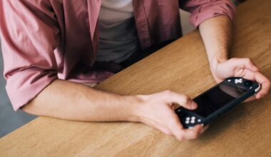 A person playing a mobile game on a smartphone.