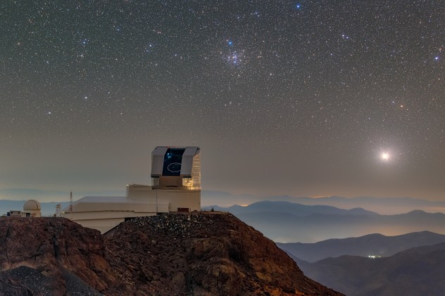 NSF-DOE Vera C. Rubin Observatory is seen with its dome open during First Look observation activities in April 2025. Messier 41, the Little Beehive Cluster, can be seen over the telescope in this telelens photo.