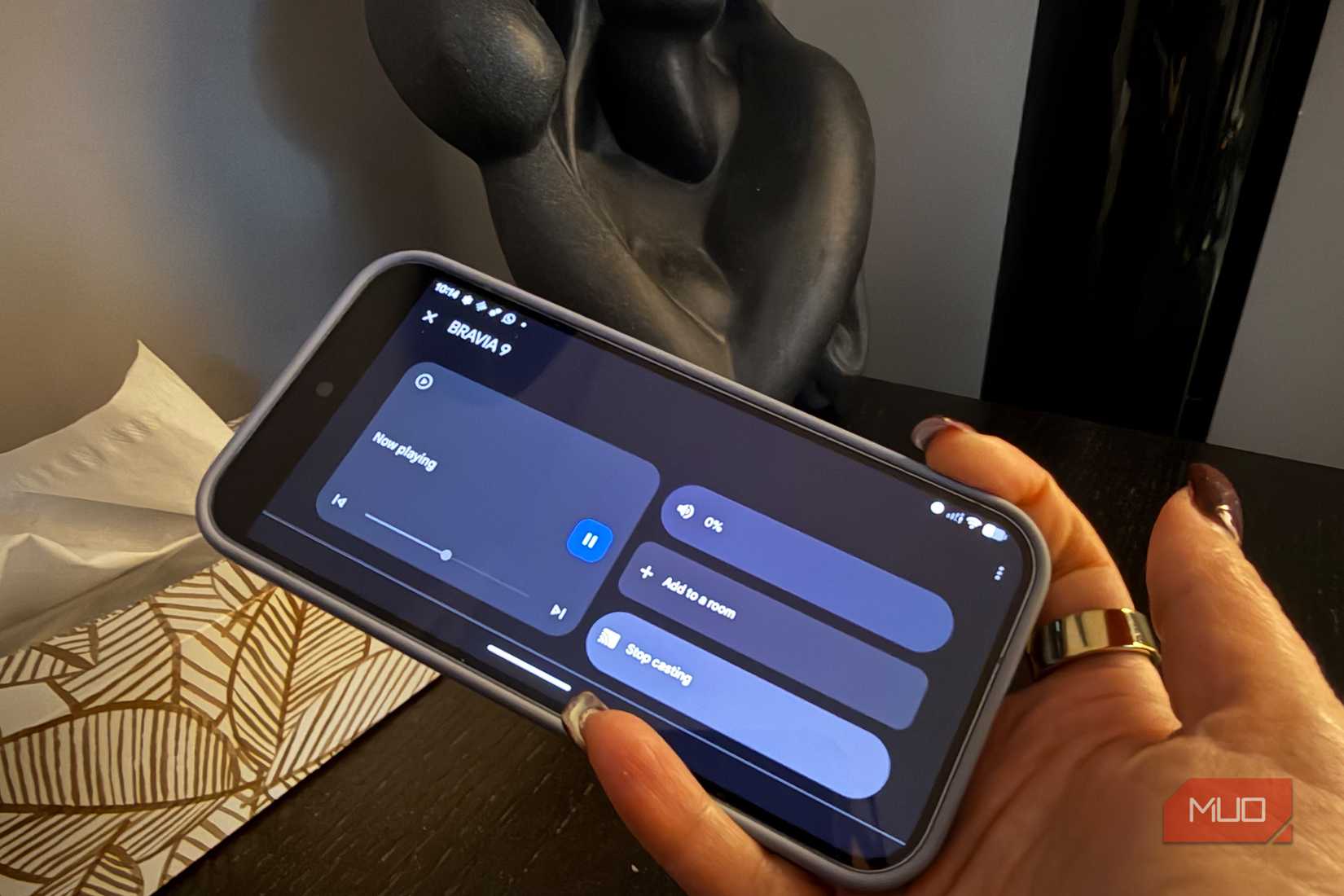 An Android phone showing the Google Home app with a TV controller.