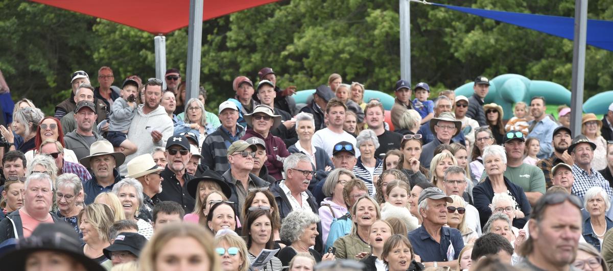 Wet track no worry for racing crowd