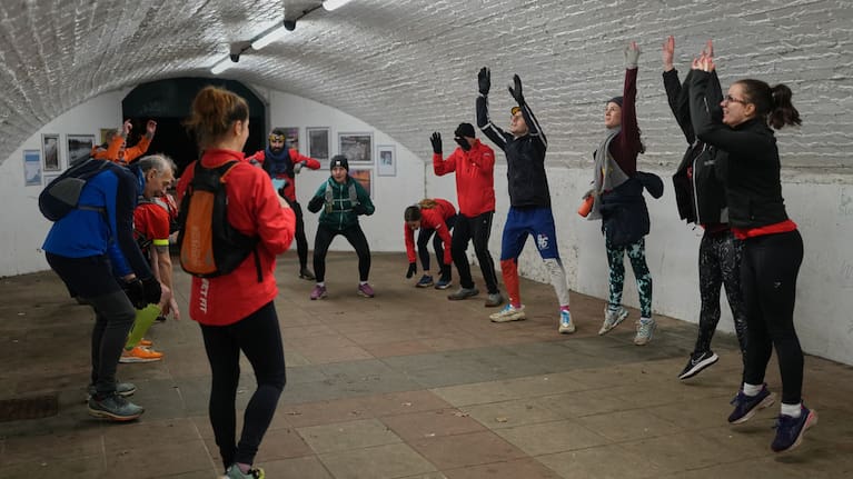 Participants in the Goodgym group exercise after collecting litter to keep the River Thames free of plastic and other waste in London, Wednesday, January 14, 2026.