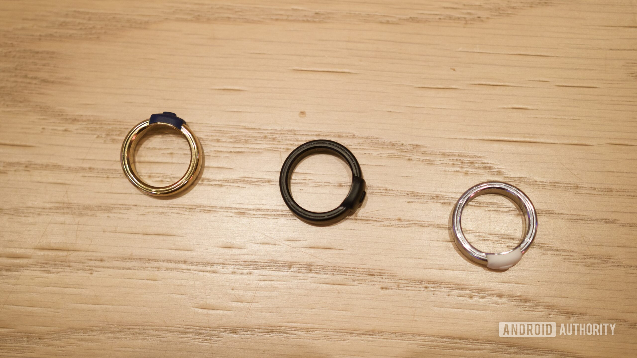 pebble index hands on ces 1 Three Pebble Index 01 rings laying on a table.