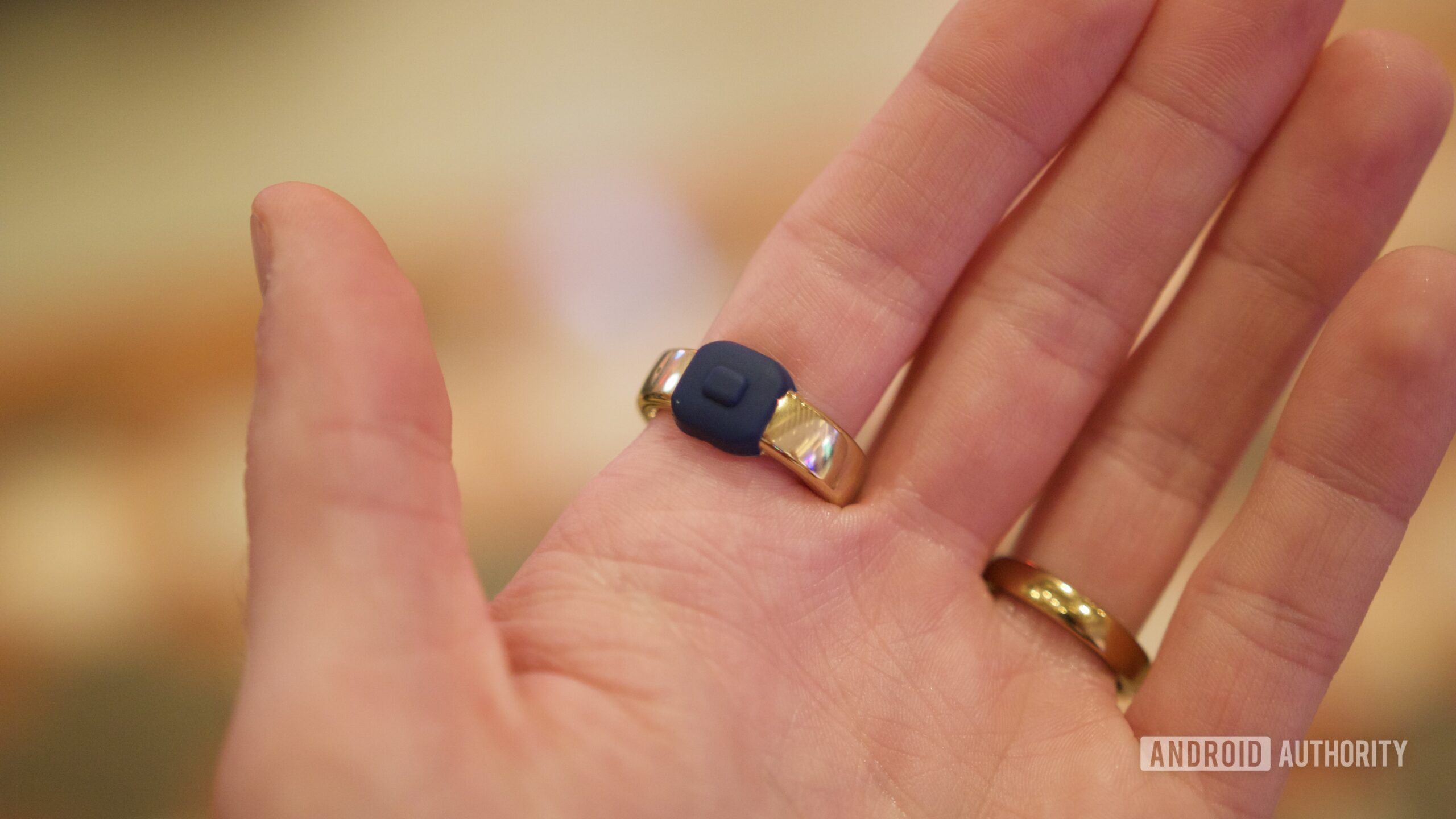 pebble index hands on ces 5 Someone wearing the Pebble Index 01 ring, showing the button.