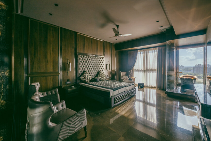 penthouse residence by metaphors blends neo-classical detail with brutalist geometry