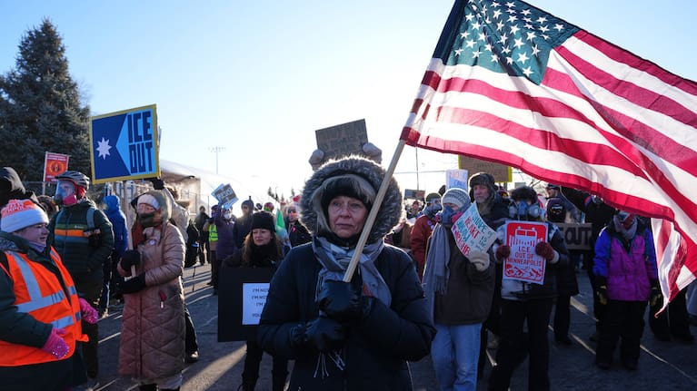 People gather for a protest against ICE outside the Bishop Henry Whipple Federal Building in Minneapolis.