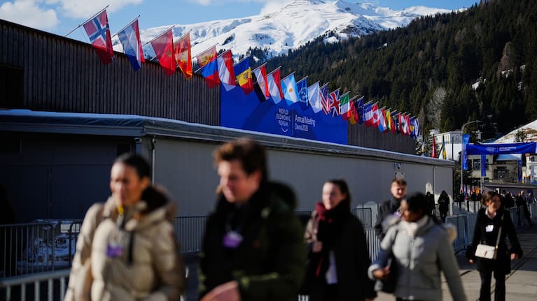 People walk at the Promenade in front of the Congress Center where the Annual Meeting of the World Economy Forum take place.