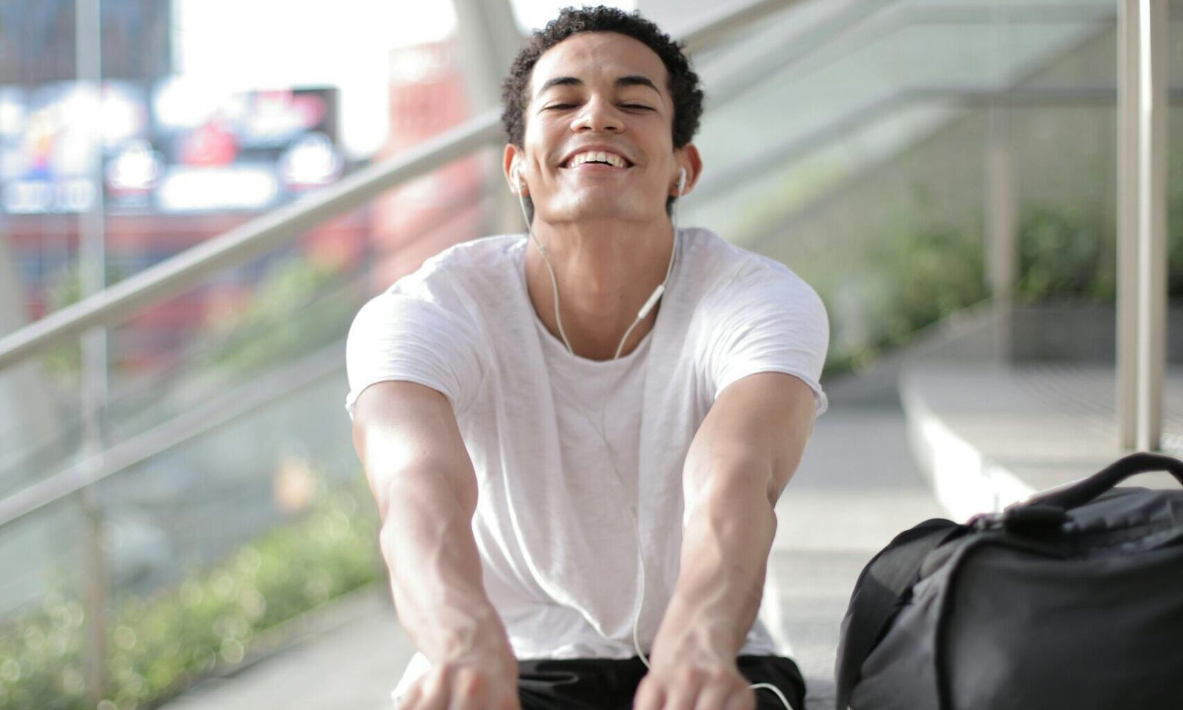 man smiling happy stretching