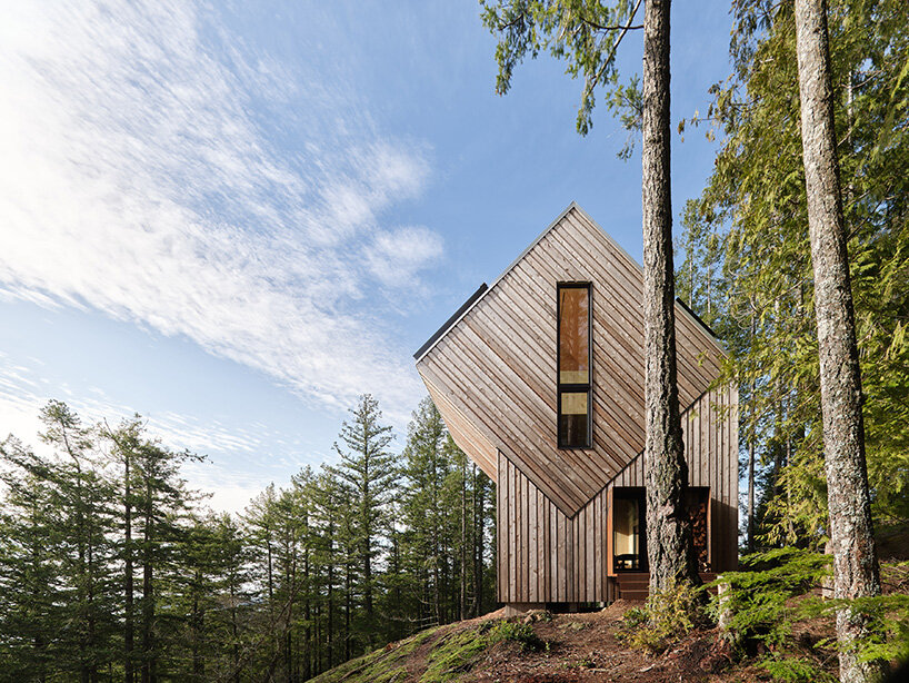 prefabricated mass timber retreat by daria sheina studio lands on remote canadian island