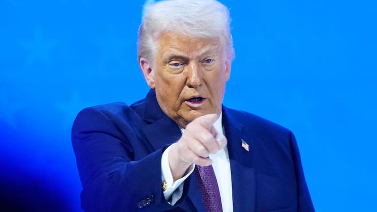 President Donald Trump reacts during a signing ceremony on his Board of Peace initiative at the Annual Meeting of the World Economic Forum in Davos, Switzerland, Thursday, January 22, 2026.