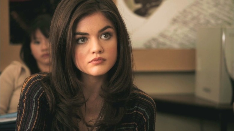 Aria Montgomery looking upward in class
