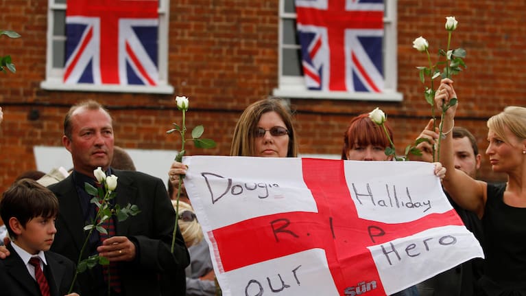 Relatives of British Army Private Douglas Halliday, of the 1st Battalion The Mercian Regiment, one of the seven British soldiers killed in Afghanistan Tuesday, June 29, 2010.