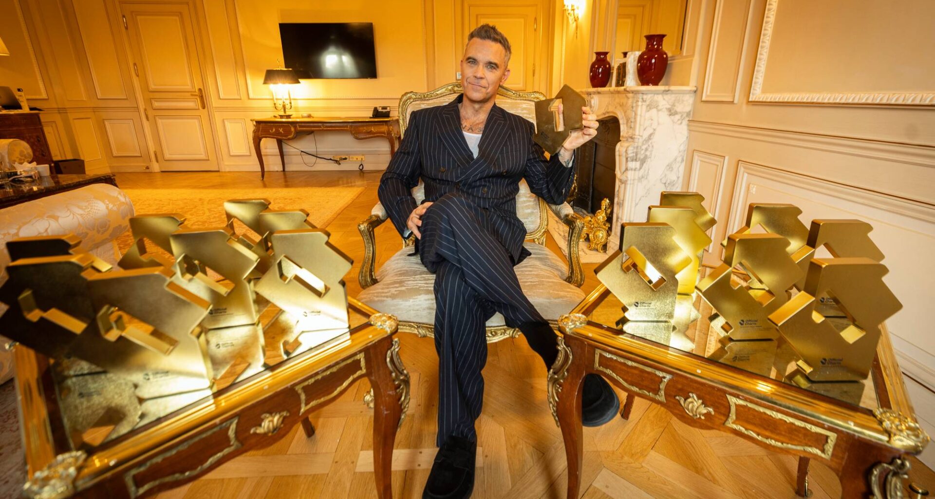 Robbie Williams tops The Beatles' record for UK Number One albums with 'BRITPOP'