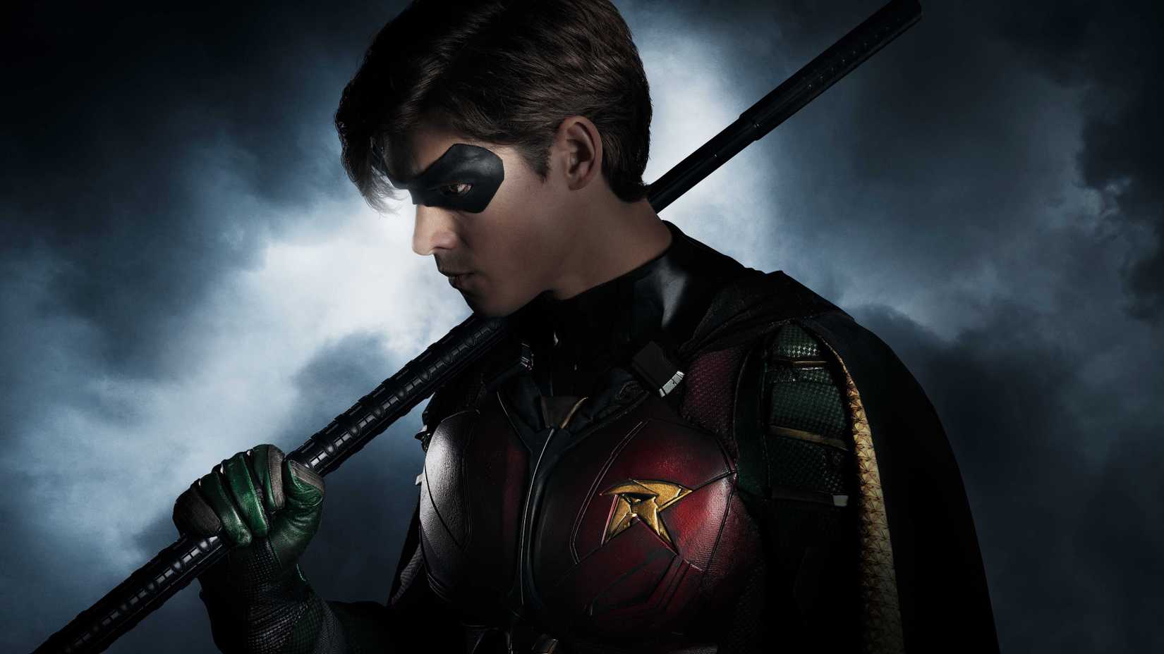 Robin reveal image for Titans with the character holding a weapon over one shoulder