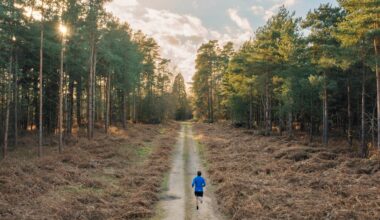 man running through woods