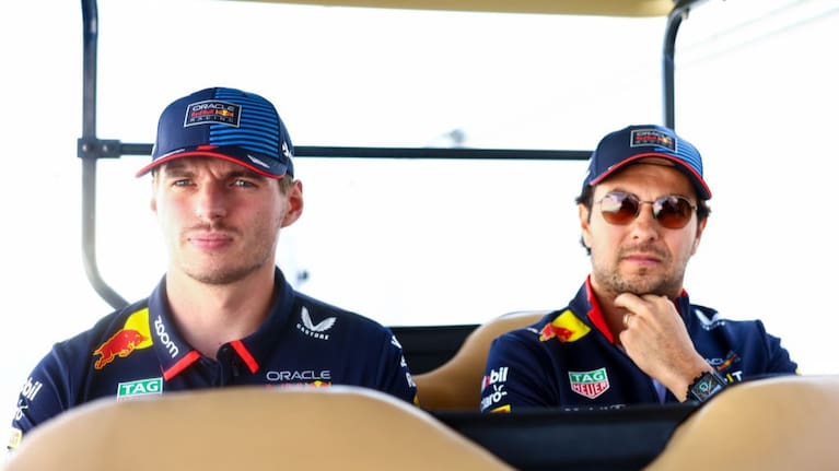 Sergio Perez of Mexico and Oracle Red Bull Racing and Max Verstappen of the Netherlands and Oracle Red Bull Racing look on prior to the F1 Grand Prix of Abu Dhabi.