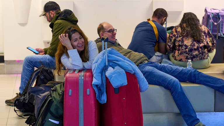 Stranded travellers wait at Schiphol airport in Amsterdam, Netherlands.