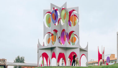 colored discs move through daxing jizi design's installation in beijing