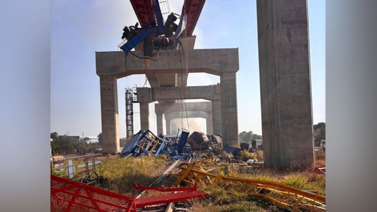 The aftermath of a construction crane falling into a passenger train in Nakhon Ratchasima province. (Source: State Railway of Thailand via AP)