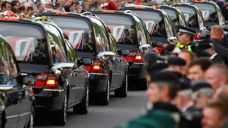 The coffins of seven British soldiers killed in Afghanistan, are driven through the town of Wootton Bassett, England.