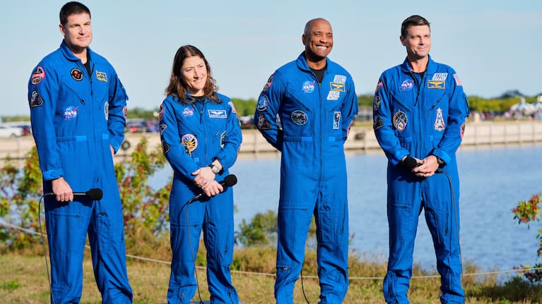 The crew of the new NASA moon rocket, Artemis II, take part in a news conference.