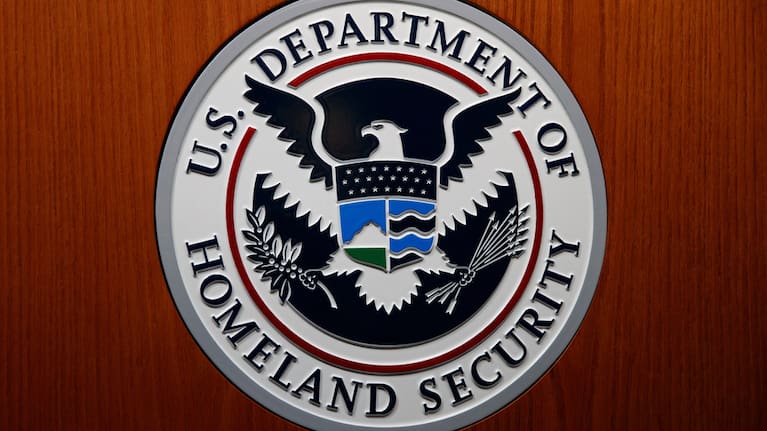 The Department of Homeland Security (DHS) seal during a news conference.
