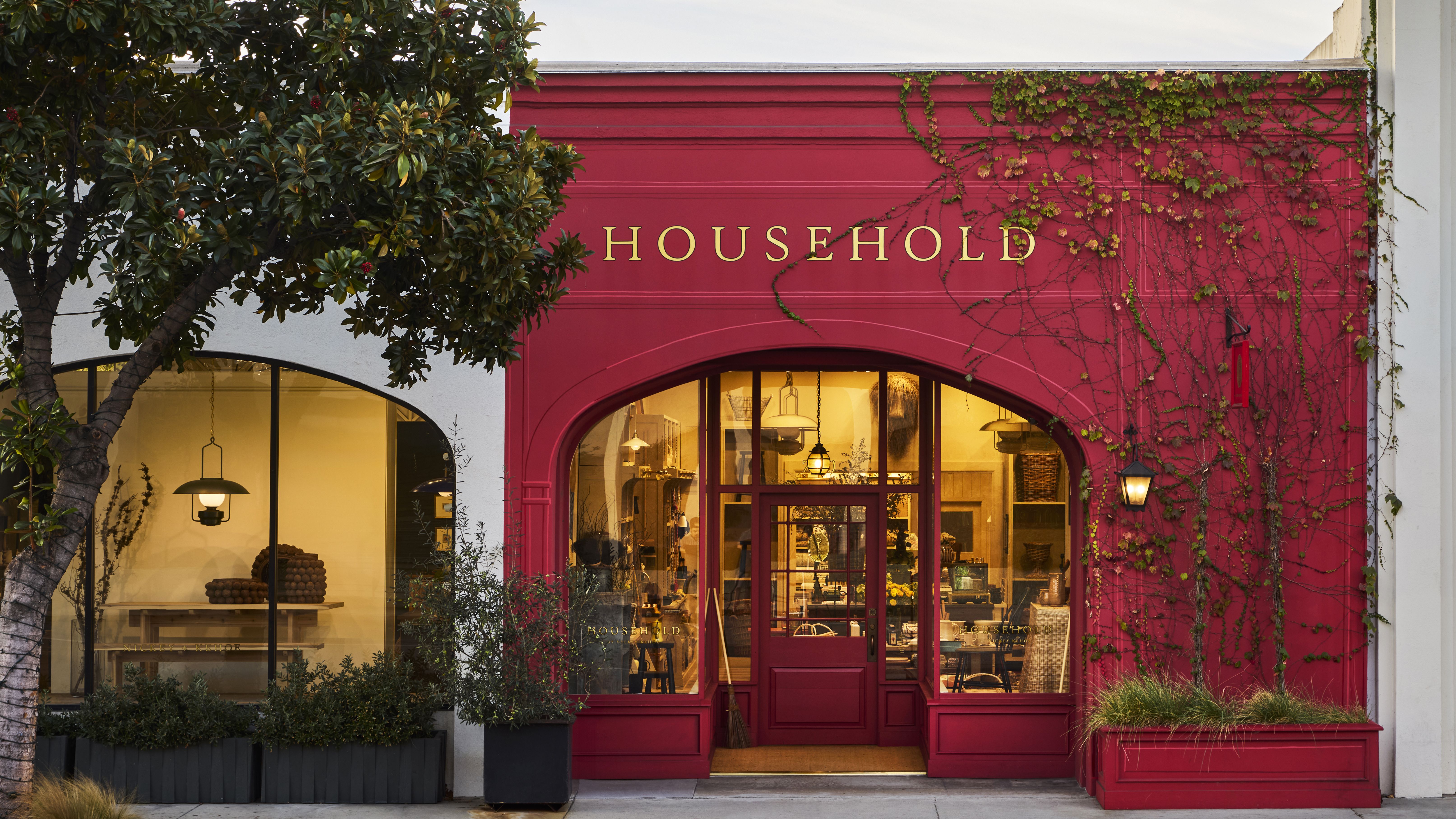A red painted store in LA with the word 'Household' in bright letter above the glass front entrance.
