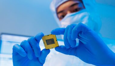 Inspector looking at a microchip.