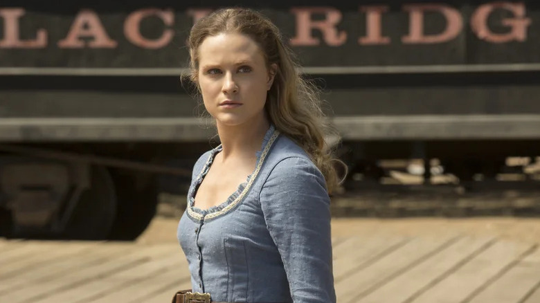 Dolores Abernathy (Evan Rachel Wood) stands defiantly at a train station in Westworld
