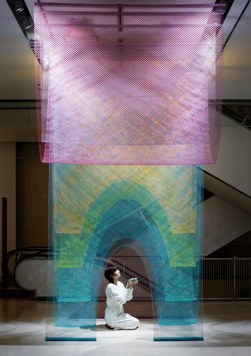 luminous layers of colored wire mesh weave tea ceremony house by moriyuki ochiai