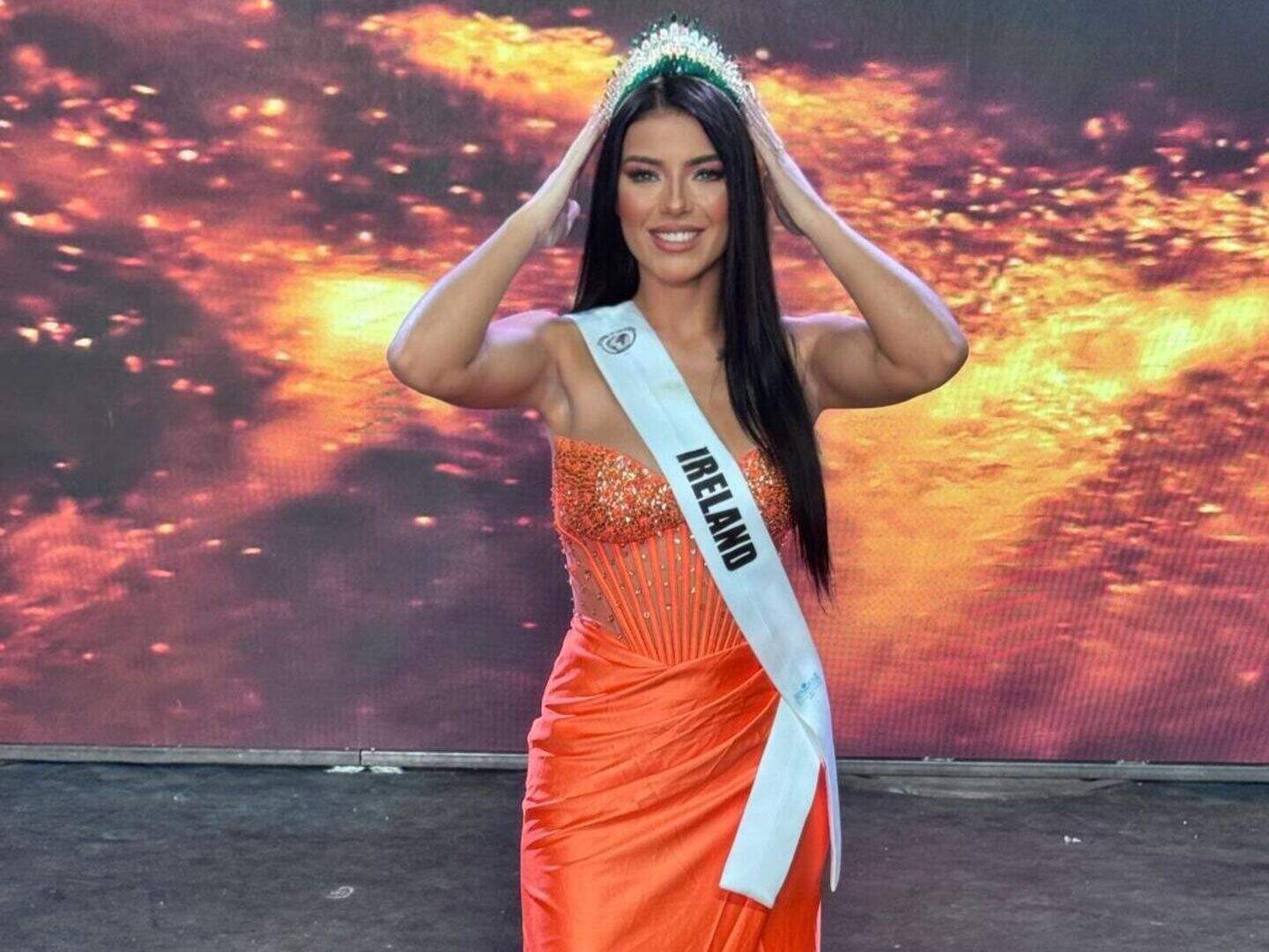 Kristine Subrovska wearing a crown and "Ireland" sash.