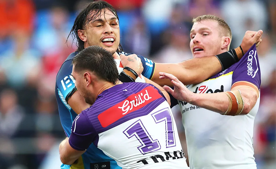 Tino Fa'asuamaleaui in action for the Gold Coast Titans against Melbourne Storm.