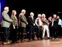 MC Bruce Wylie congratulates inductees into the Brockville and Area Music and Performing Arts Hall of Fame, or their representatives, on the Brockville Arts Centre stage on Thursday night, March 27, 2025. 