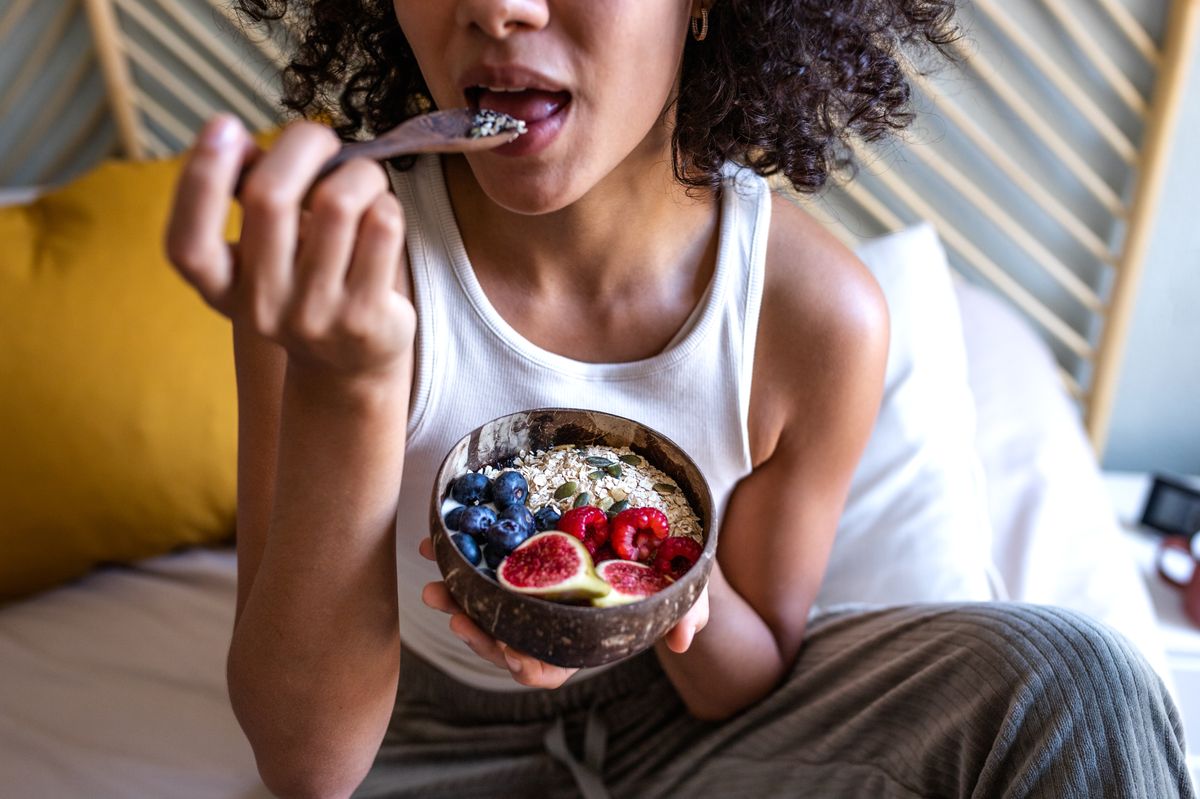 Woman eating breakfast