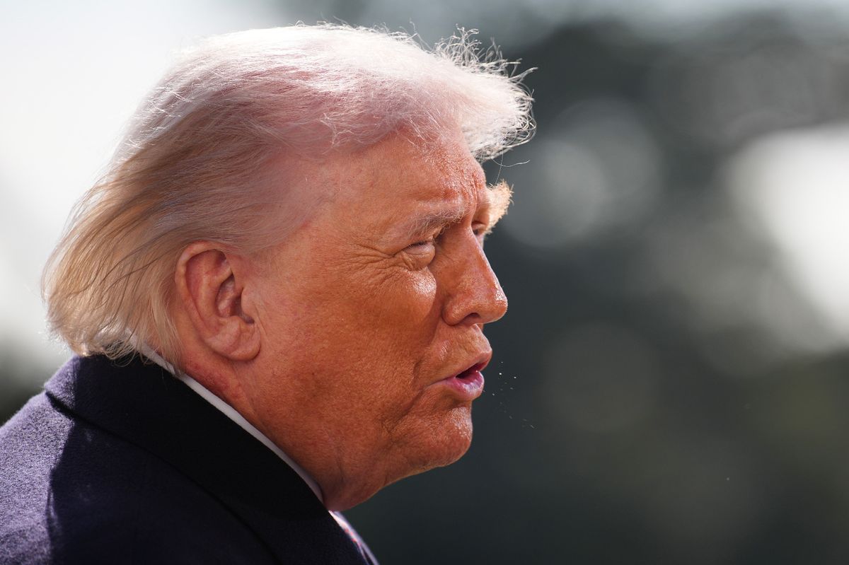 U.S. President Donald Trump stops to speak to the media as he departs on Marine One