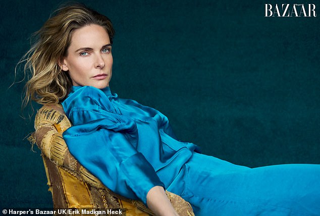 For her final look, Rebecca looked nothing short of sensational in a vibrant blue dress as she reclined on a vintage chair