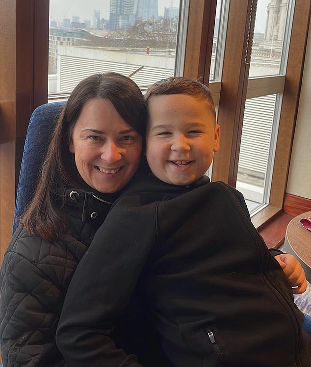David McKenna with his mother Elizabeth, who donated her kidney to him at the age of 10