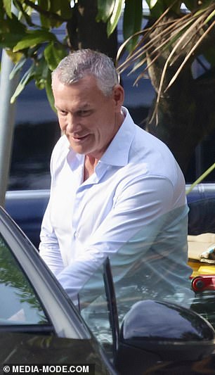 Ed Savage, a a contract logistics manager at a transport company arrives with luggage at Tresco Estate