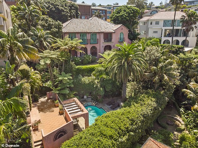Villa Biscaya, the opulent pink Rose Bay house featured in Vogue and on Married At First Sight, The Bachelor and The Voice has been the subject of a stoush after four mature palm trees were cut down on a neighbouring property